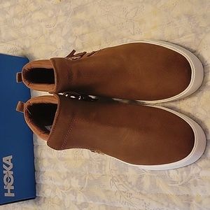 Brown keds.  Zip up side
